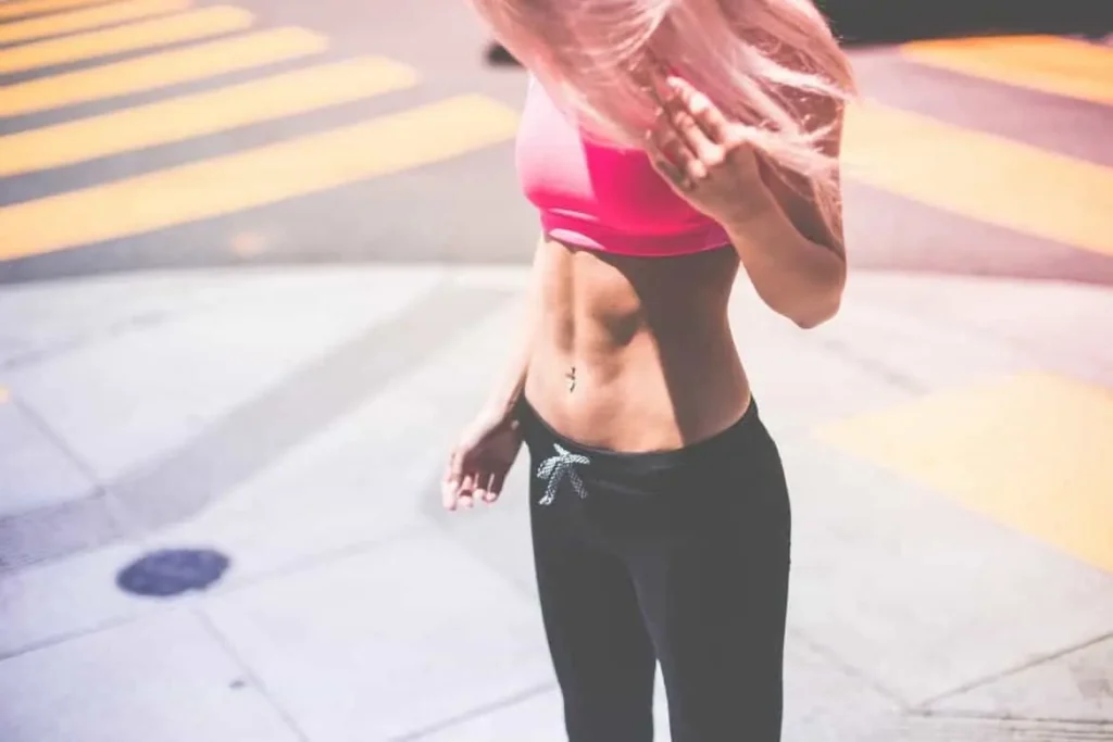Woman with toned stomach after LA-EMS Body Sculpting Treatment Cricklewood